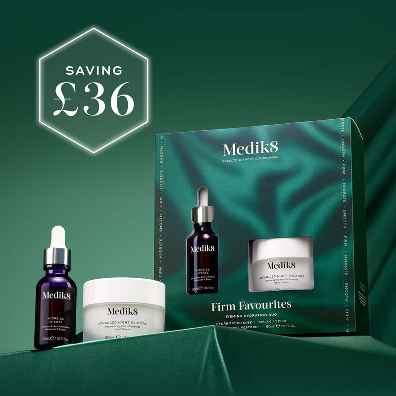Medik8 Firm Favourites Kit with packaging on a green background, showing a saving of £36.
