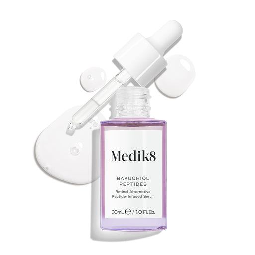 A purple glass dropper bottle of Bakuchiol Peptides serum, with its dropper removed. A swirl of the serum is shown, emphasising the product's texture.