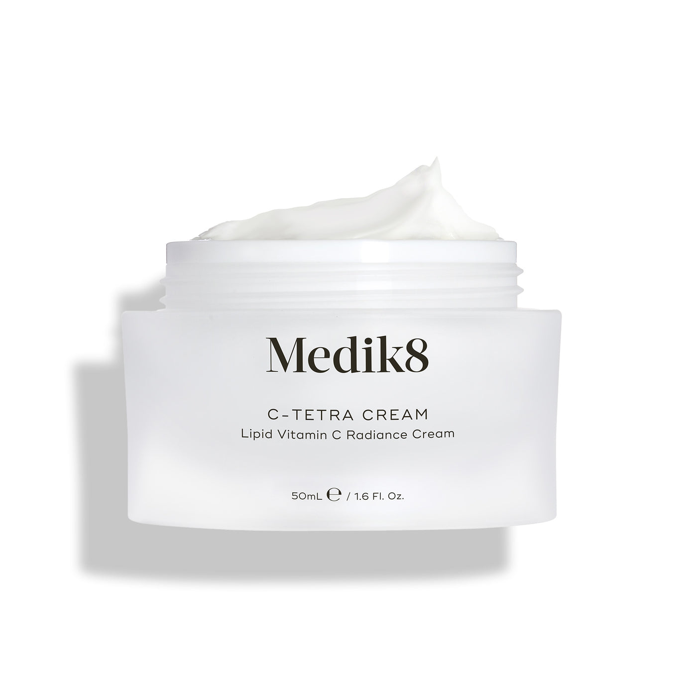 Medik8 C-Tetra Cream jar displayed open against a clean white background with soft shadows. The white, frosted-glass jar features the Medik8 logo and is labeled 