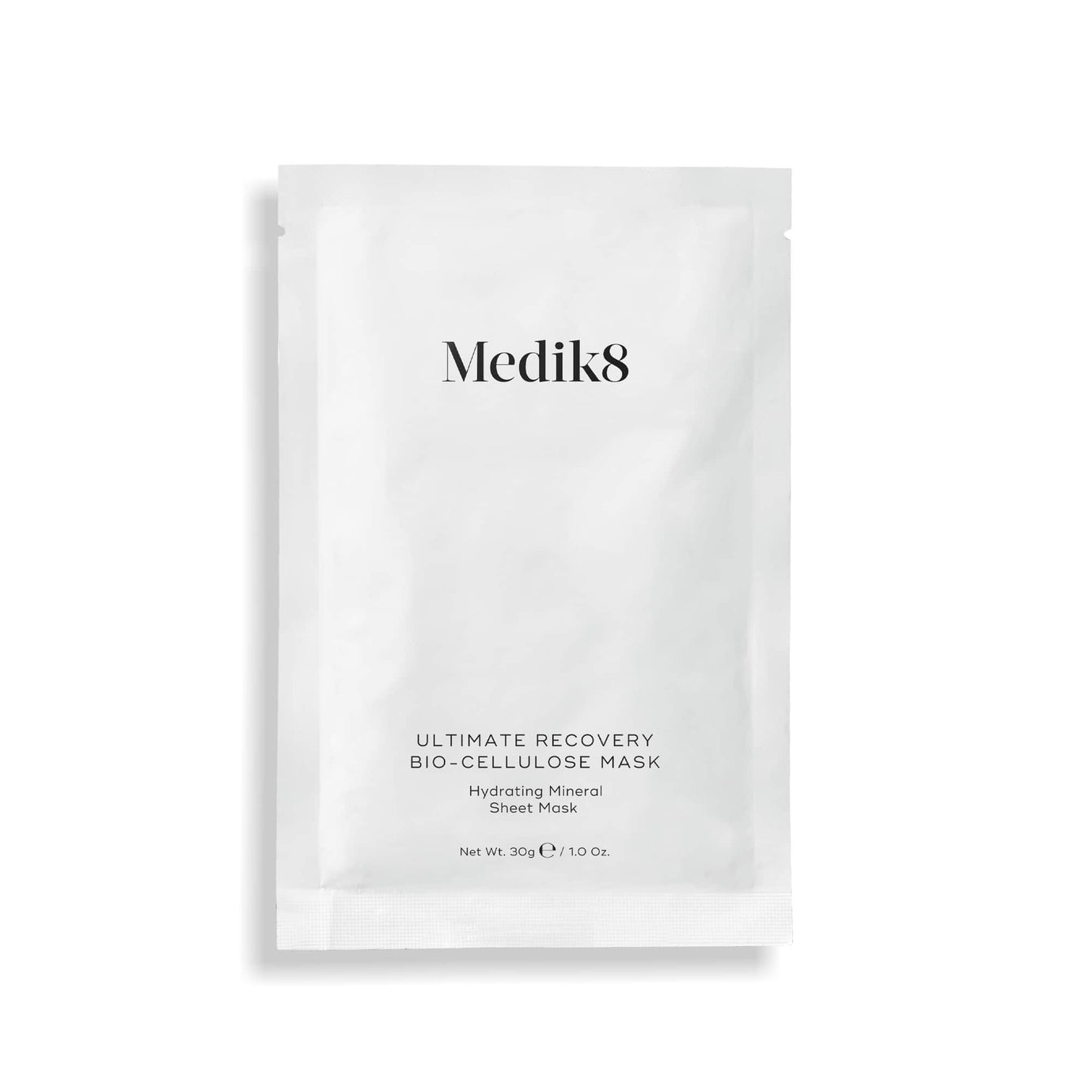 A single white sachet of Medik8 Ultimate Recovery Bio-Cellulose Mask displayed flat against a clean white background with a subtle shadow. Text labels it as a 
