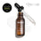 Medik8 C-Tetra Luxe serum bottle shown open with its glass pipette resting against the rim, displayed on a white background with clear, translucent serum droplets. The image includes a "GET THE GLOSS BEAUTY AWARDS GOLD 2024" seal in the top left and a "DERMATOLOGIST RECOMMENDED" emblem with a magnifying glass icon in the top right.